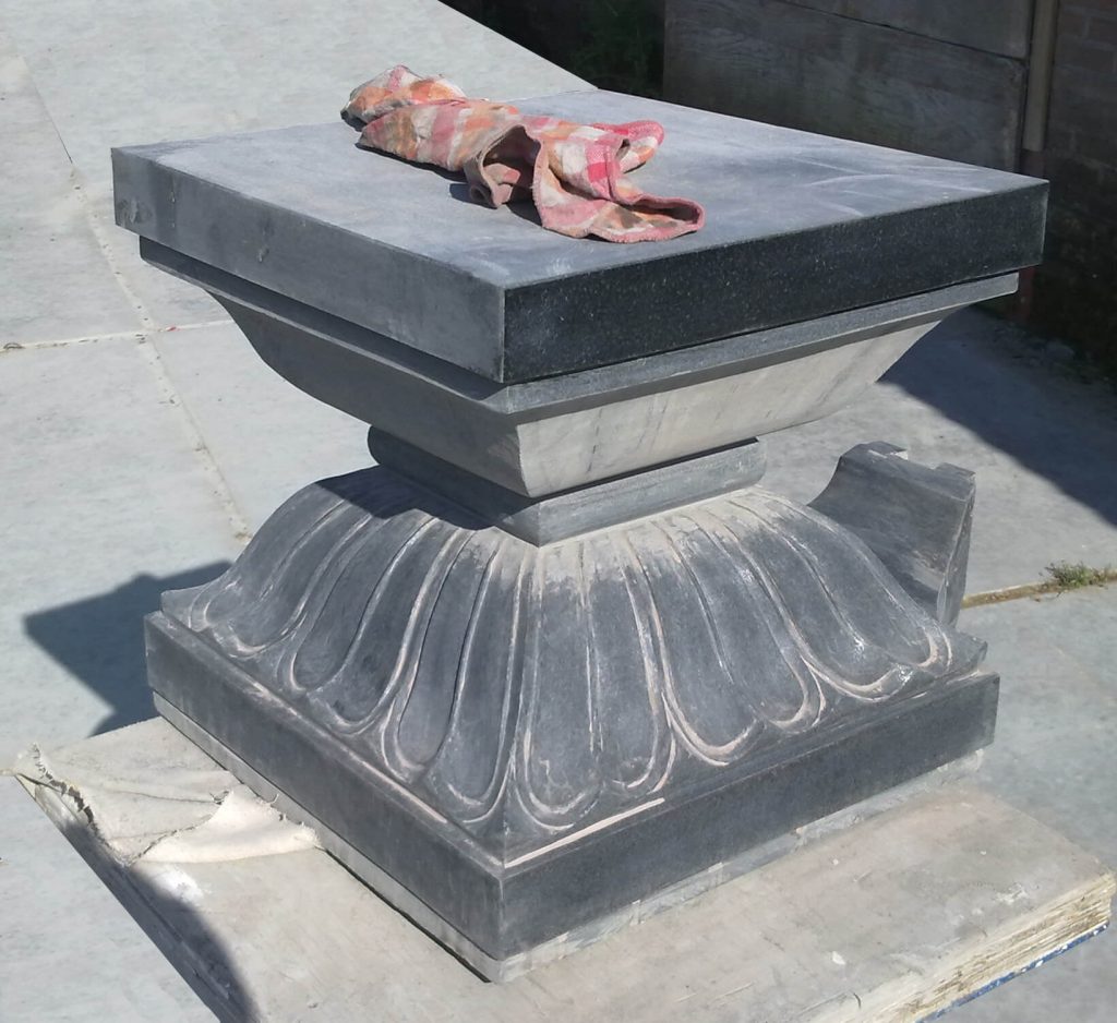 black granite paanipeetham being polished. Shivalinga+yoni