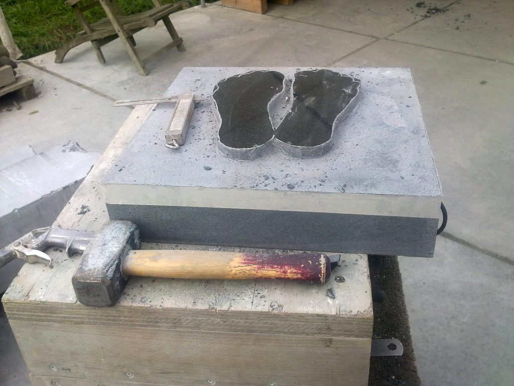 Paduka's in zwart graniet- voorzagen