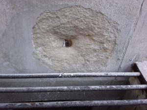 rusting iron in limestone